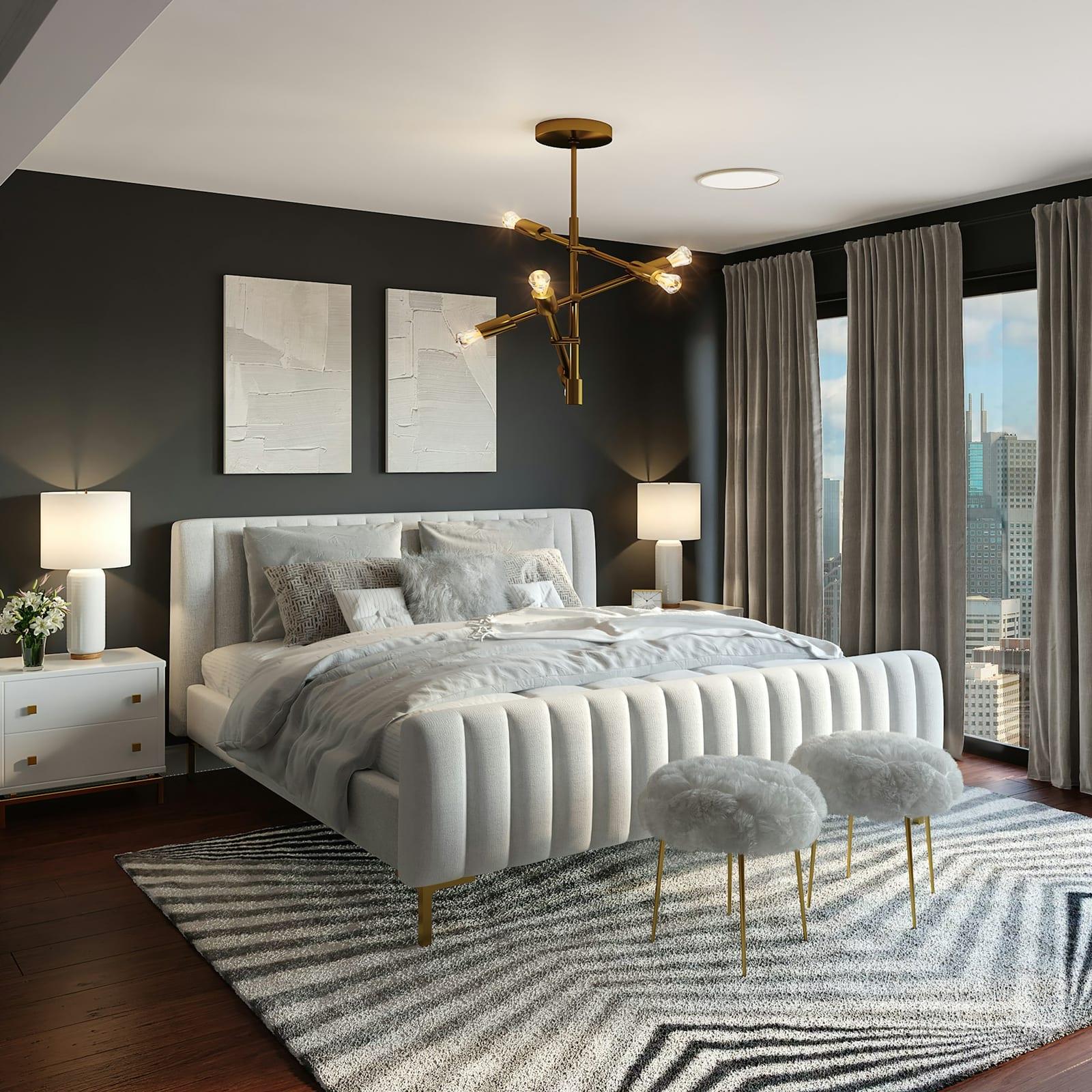 Bedroom with dark charcoal feature wall, brass chandelier and city view